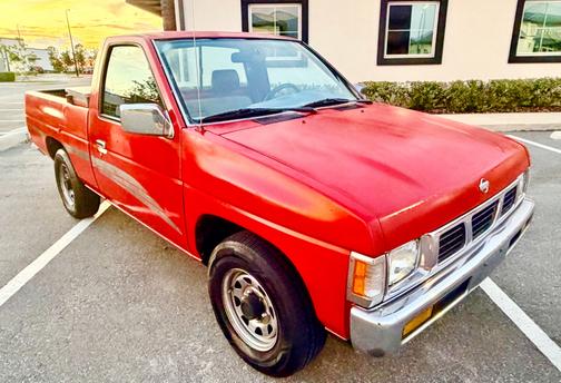 Red 1995 Nissan Pickup Truck XE