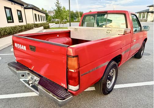 Red 1995 Nissan Pickup Truck XE