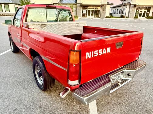 Red 1995 Nissan Pickup Truck XE