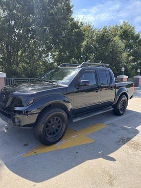 Black 2012 Nissan Frontier SL