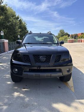 Black 2012 Nissan Frontier SL