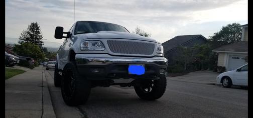 White 1999 Ford F-150 XLT SuperCab