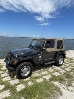 Black 1999 Jeep Wrangler Sahara