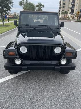 Black 1999 Jeep Wrangler Sahara