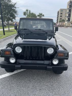 Black 1999 Jeep Wrangler Sahara