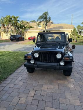 Black 1999 Jeep Wrangler Sahara