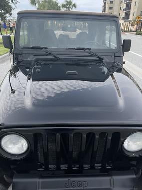 Black 1999 Jeep Wrangler Sahara