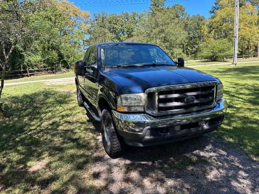 Blue 2003 Ford F-250 Lariat SuperCab Super Duty