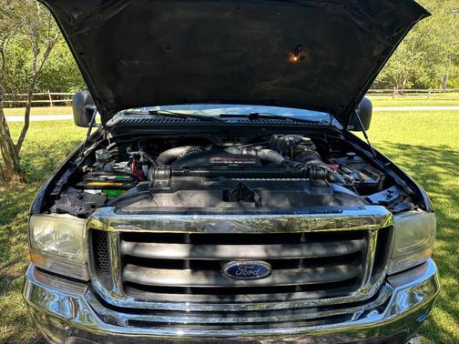 Blue 2003 Ford F-250 Lariat SuperCab Super Duty