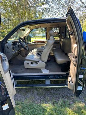 Blue 2003 Ford F-250 Lariat SuperCab Super Duty