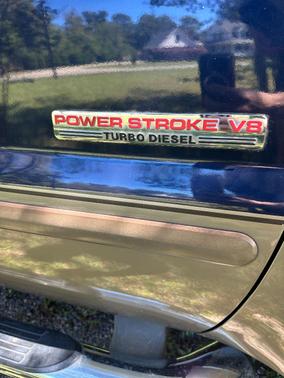 Blue 2003 Ford F-250 Lariat SuperCab Super Duty