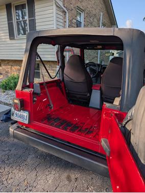 Red 1997 Jeep Wrangler SE