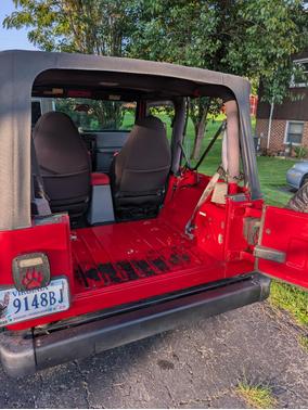 Red 1997 Jeep Wrangler SE