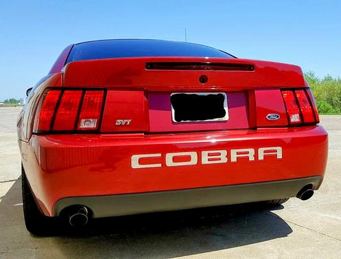Red 2004 Ford Mustang SVT Cobra