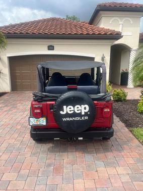 Red 1998 Jeep Wrangler Sport