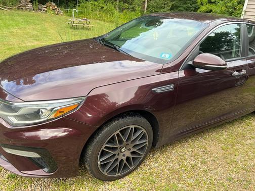 Red 2019 Kia Optima LX