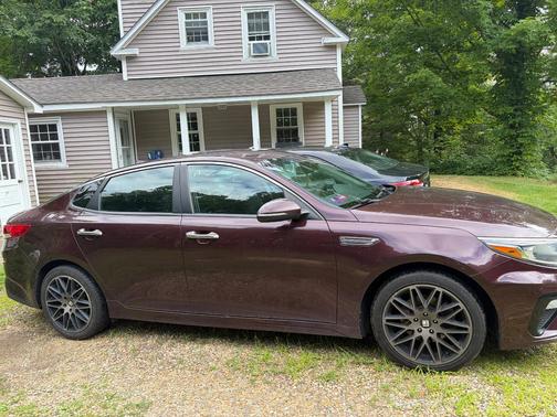 Red 2019 Kia Optima LX