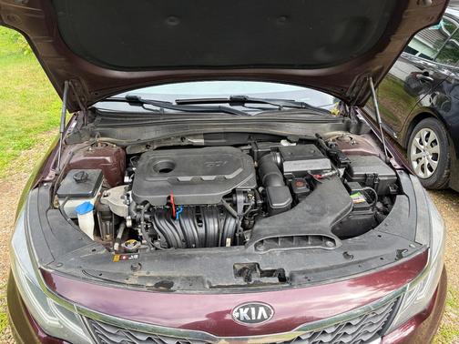Red 2019 Kia Optima LX