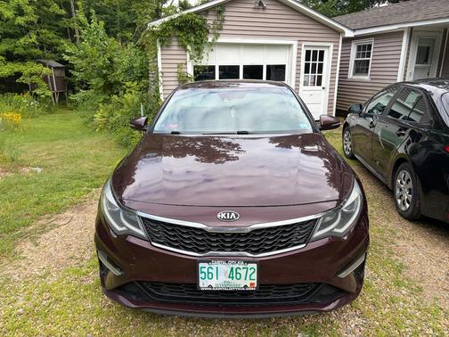 Red 2019 Kia Optima LX