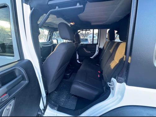 White 2015 Jeep Wrangler Unlimited Willys Wheeler