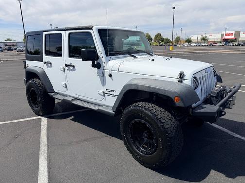 White 2015 Jeep Wrangler Unlimited Sport