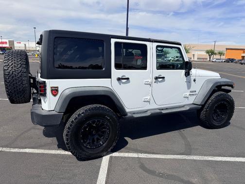 White 2015 Jeep Wrangler Unlimited Sport