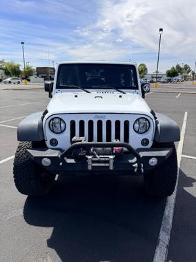 White 2015 Jeep Wrangler Unlimited Sport