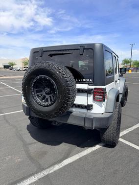 White 2015 Jeep Wrangler Unlimited Sport