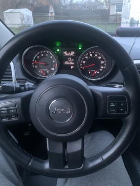 Black 2012 Jeep Grand Cherokee Laredo