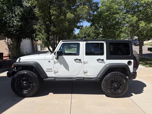 White 2012 Jeep Wrangler Unlimited Sport