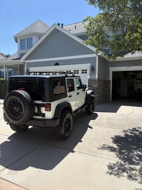 White 2012 Jeep Wrangler Unlimited Sport