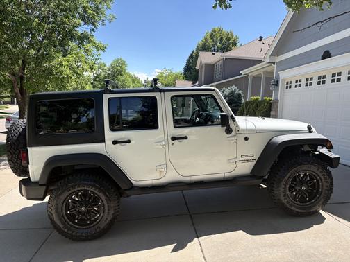 White 2012 Jeep Wrangler Unlimited Sport