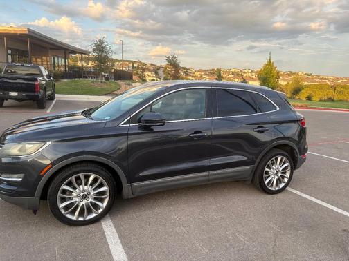 Blue 2015 Lincoln MKC Base