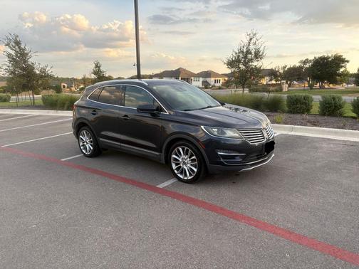 Blue 2015 Lincoln MKC Base