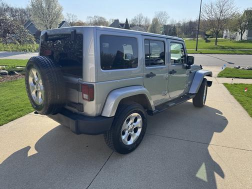 Silver 2013 Jeep Wrangler Unlimited Sahara