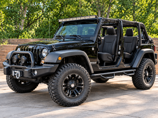 Black 2015 Jeep Wrangler Unlimited Sport