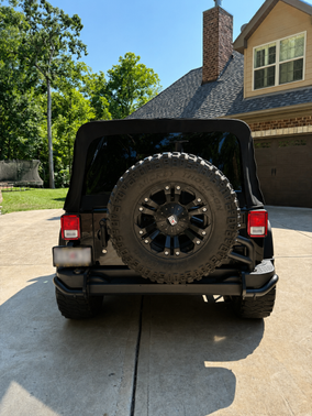Black 2015 Jeep Wrangler Unlimited Sport