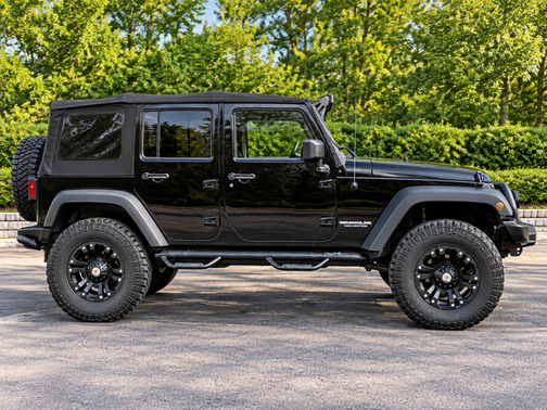 Black 2015 Jeep Wrangler Unlimited Sport