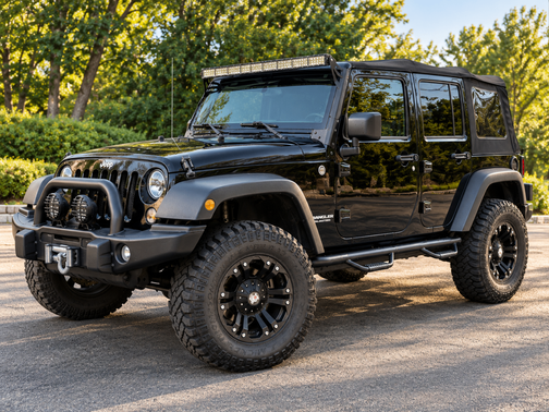 Black 2015 Jeep Wrangler Unlimited Sport