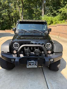 Black 2015 Jeep Wrangler Unlimited Sport