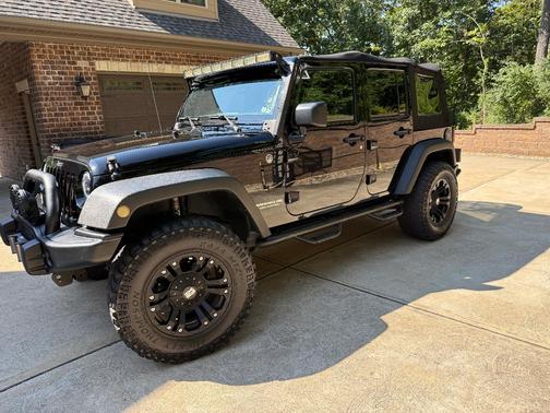 Black 2015 Jeep Wrangler Unlimited Sport