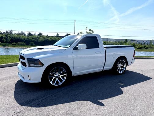 White 2015 RAM 1500 Sport