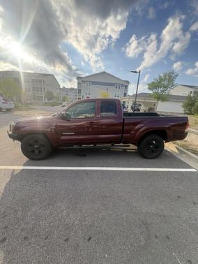 Red 2008 Toyota Tacoma Access Cab