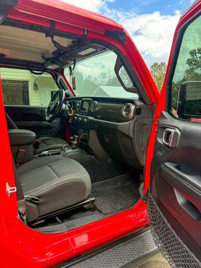 Red 2018 Jeep Wrangler Unlimited Sahara