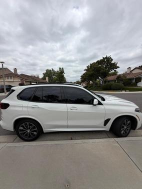 White 2024 BMW X5 PHEV xDrive50e