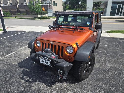 Orange 2011 Jeep Wrangler Sport