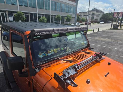 Orange 2011 Jeep Wrangler Sport