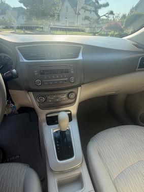Red 2014 Nissan Sentra SV