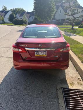 Red 2014 Nissan Sentra SV