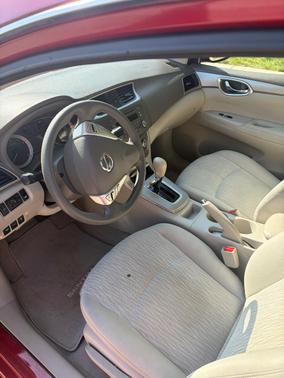 Red 2014 Nissan Sentra SV